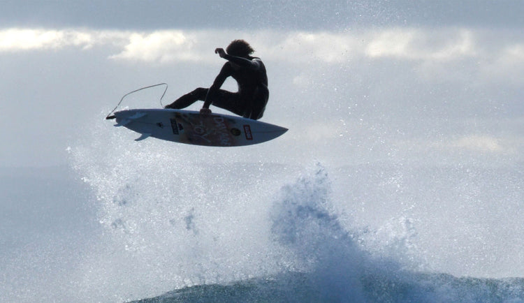 Shaun Manners surfing