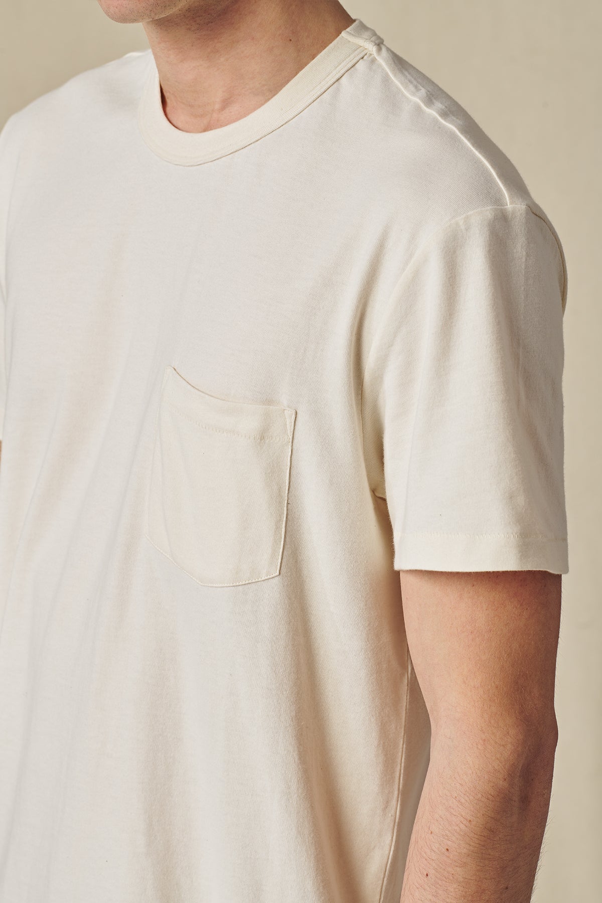 up close side view of White Globe Tee