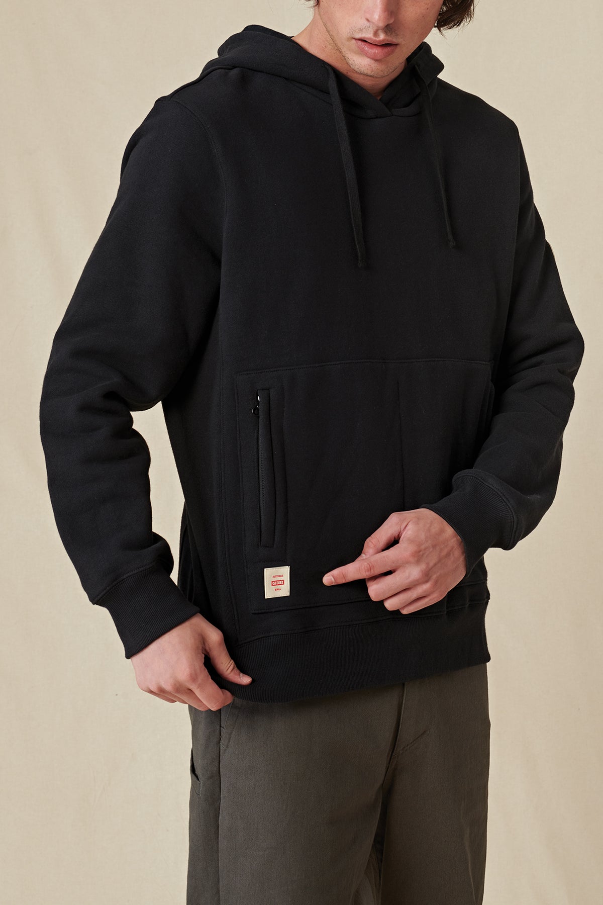 pocket profile of Black Globe hoodie