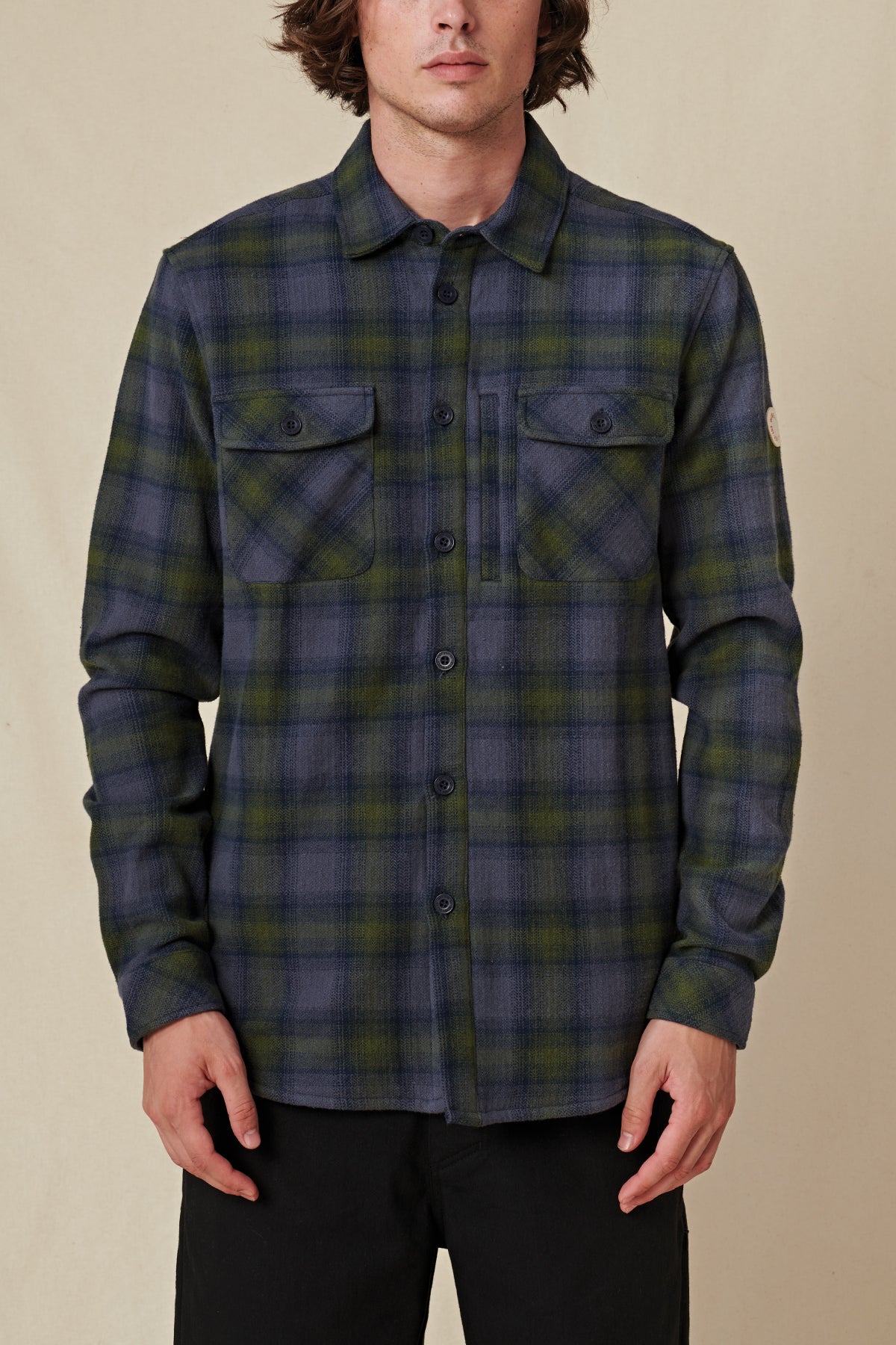 front view of Navy Globe button up jacket