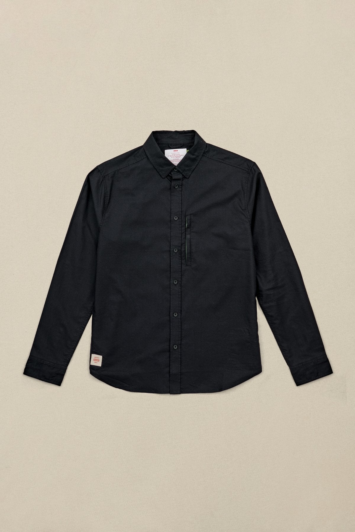 front of Black long sleeve Globe Button up