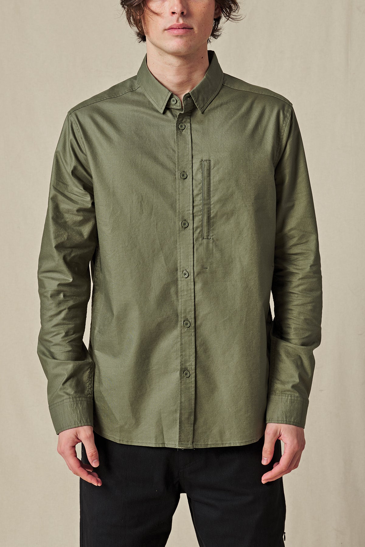 front of Olive long sleeve Globe Button up