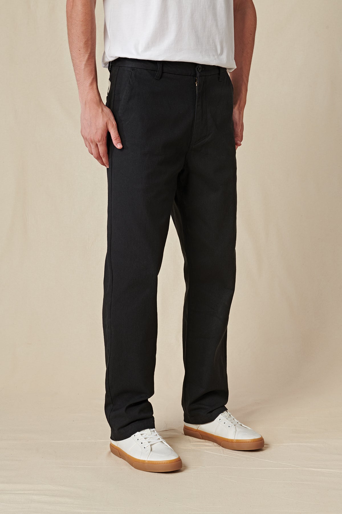 Side profile of Black Globe Pants. 