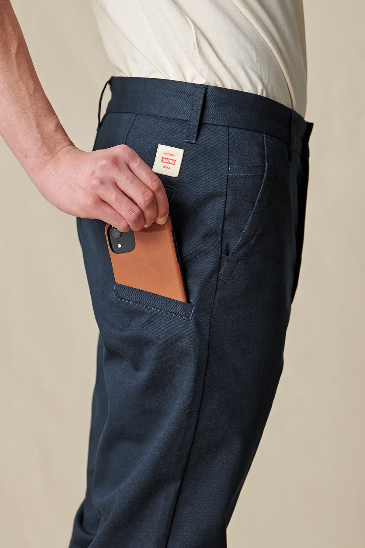 back pocket profile of Navy Globe Pants. 